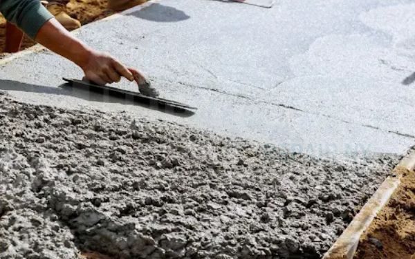 Rebuilt concrete curb along a New York City street